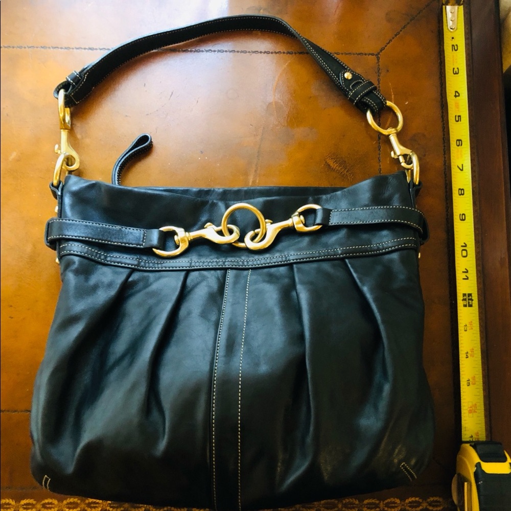 Gorgeous black Coach purse with brass detail